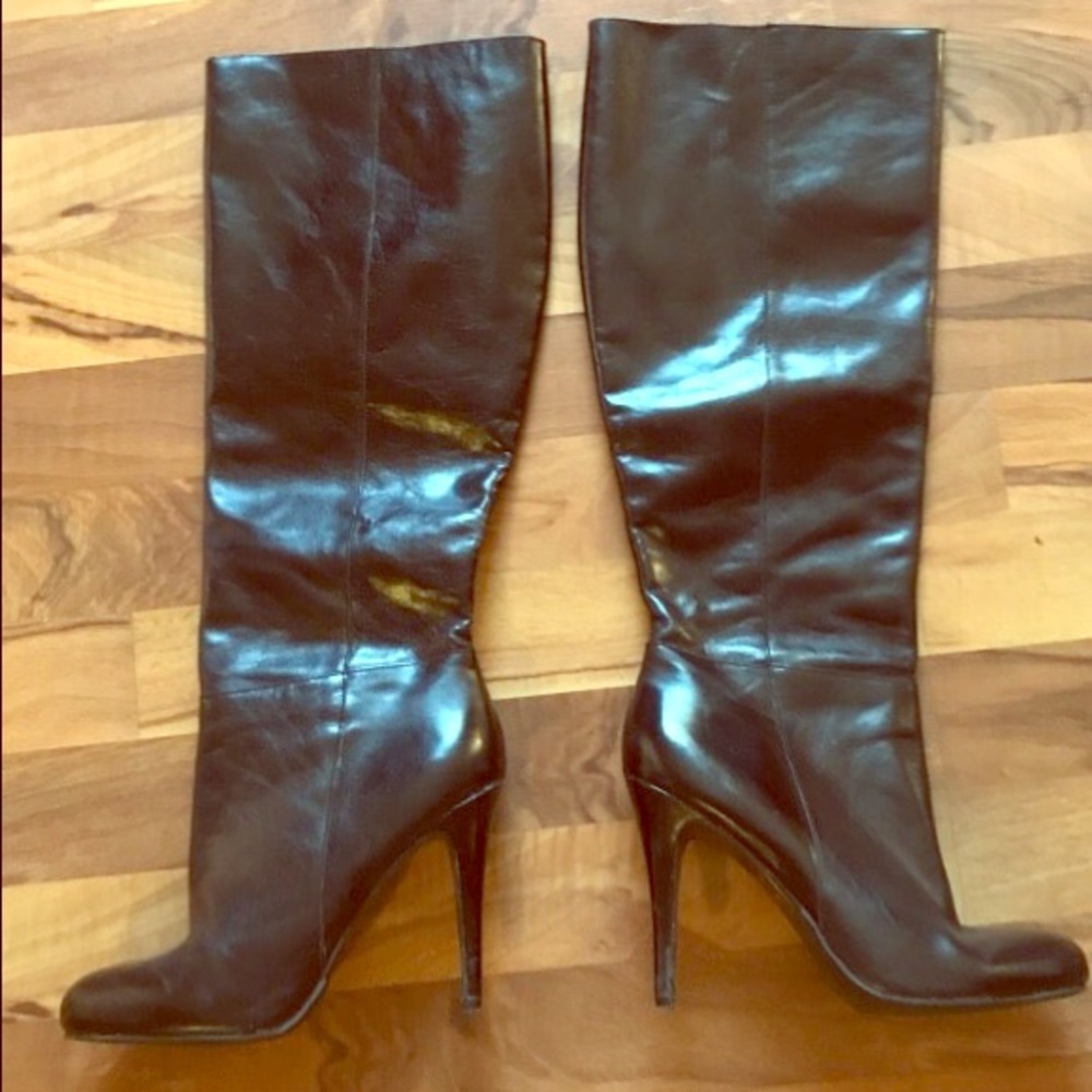 Pair of black leather knee-high boots